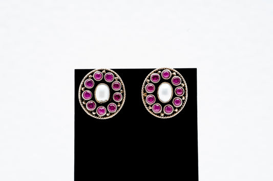 Oval stud earrings with purple stones