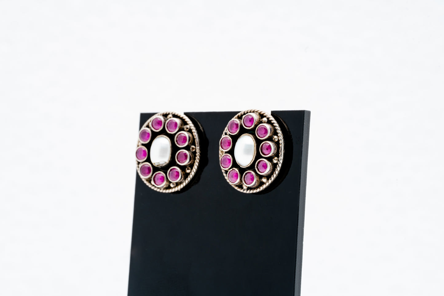 Oval stud earrings with purple stones