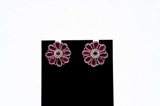 Floral silver earrings with purple stones