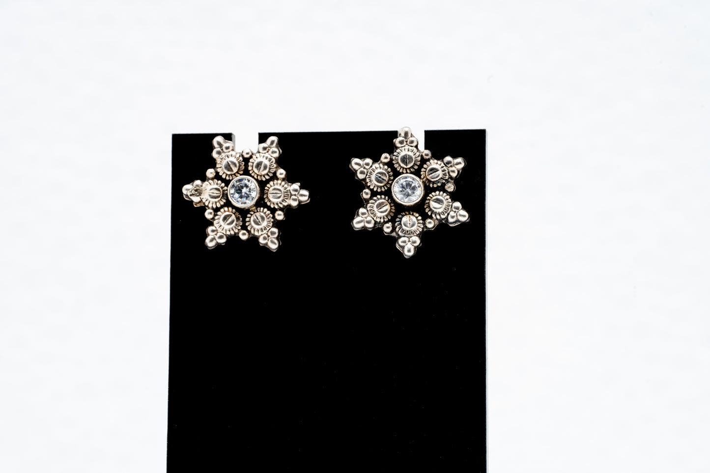 Snowflake stud earrings