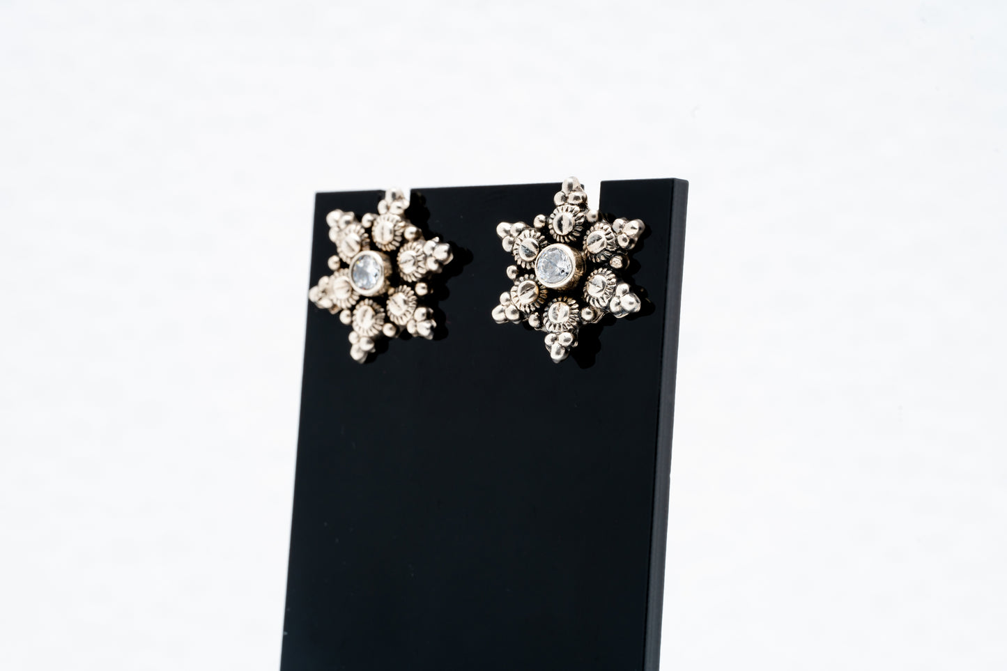 Snowflake stud earrings