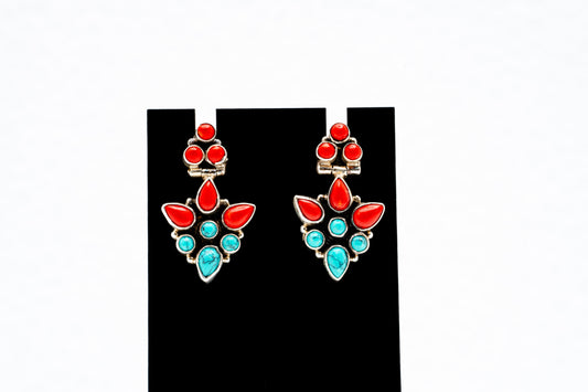 Silver hanging earrings with coral and Blue stone.