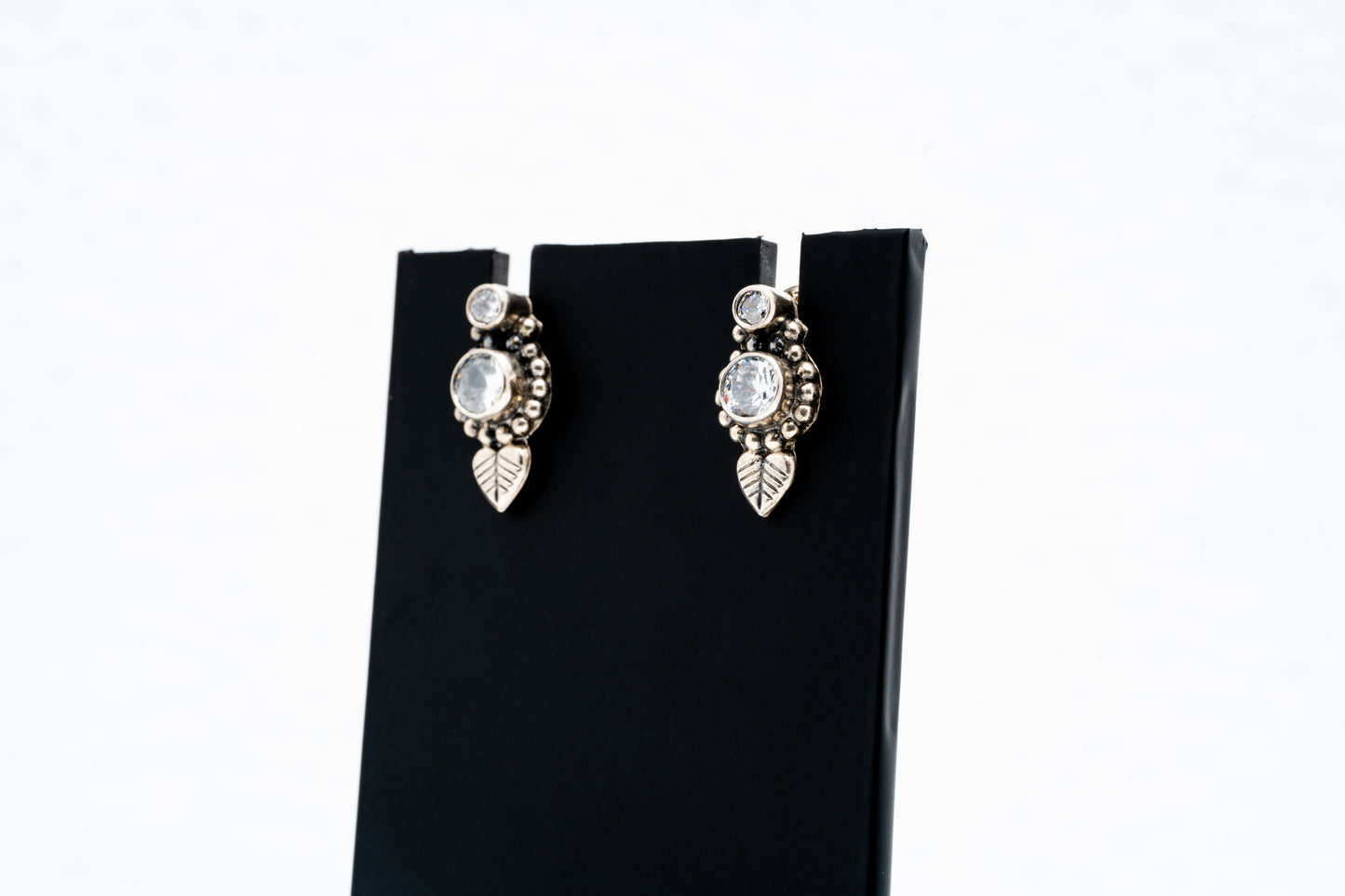 Tiny leaf hanging silver earrings