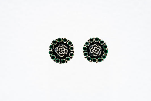 Floral silver earrings with green stone