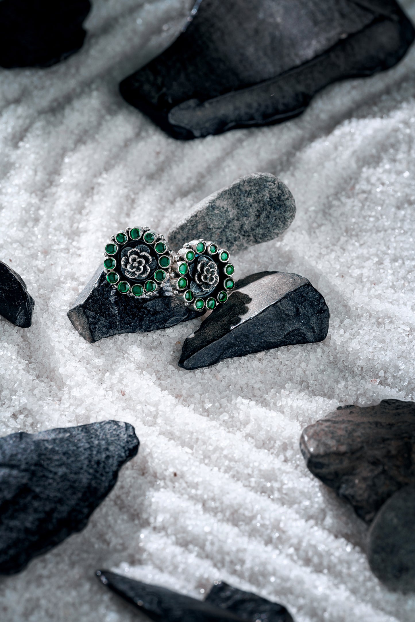 Floral silver earrings with green stone